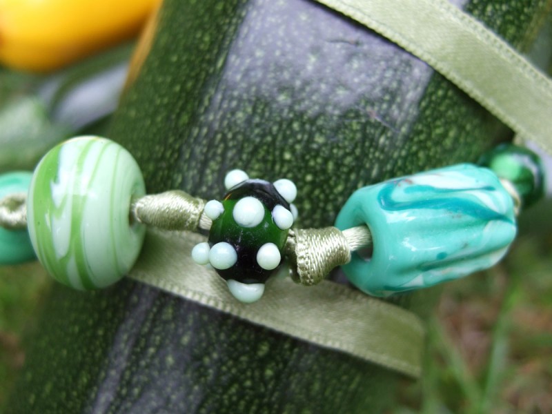 “Green Harvest”  five beads on ribbon