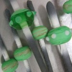green beads soaking water