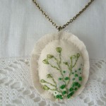 calico hand embroidered pendant