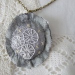 grey silk hand embroidered pendant