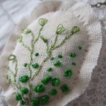 calico hand embroidered pendant - detail