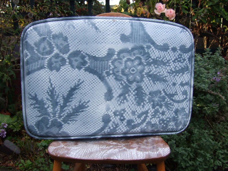 lace sprayed suitcase