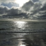 sunlight & clouds on Fairbourne beach